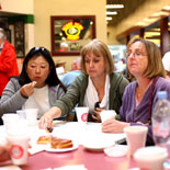 Tour guests enjoying best donuts in L.A. at Farmers Market