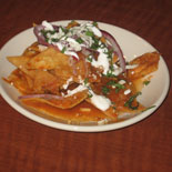 Tasting chiliquiles on the Latin Spice Food Tour