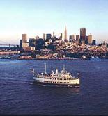 The Bay, the San Francisco Skyline and a Hornblower Yacht