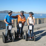 A guide and 2 guests enjoying a Fisherman's Wharf Waterfront Segway tour in San Francisco.