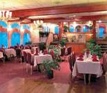 Plush dining area with individual table seating