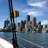 View the modern Boston skyline from this tall ship